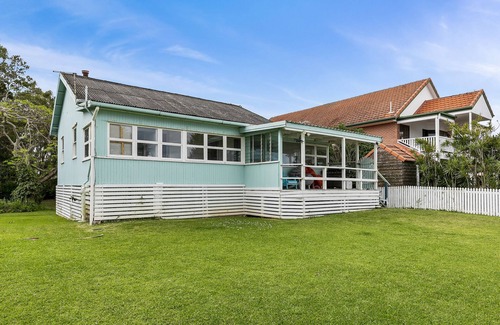 Beachmere House | Peaceful Golden Sands: Oceanfront Comfort & Pet-Friendly Stays