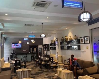 Ofin Hotel | Indulge at Golden Tulip Oniru Suites with Pool & Spa