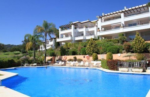 Benahavis Apartment | Golf Apartment with Roof Terrace and Oceanfront Views