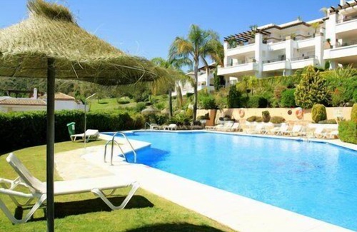 Benahavis Apartment | Golf Apartment with Roof Terrace and Oceanfront Views