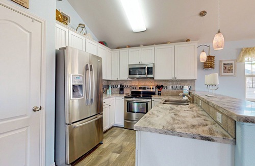 Leeward Sands House | Oceanfront 3BD Retreat with Spa & Pet-Friendly Perks
