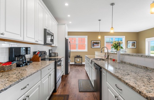 Kewadin House | Elegant 4BDR Home on Agaming Golf Course - Family Friendly