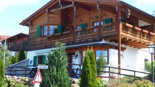 Haarbach Apartment | Charming Golfchalet Uttlau: Oceanfront Family Retreat