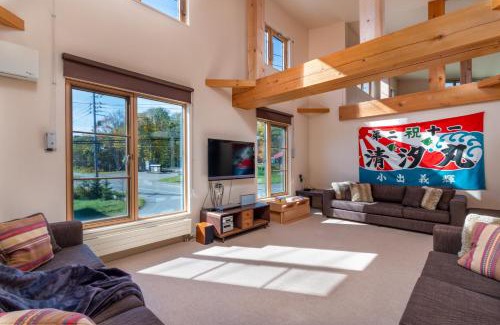 Hirafu Apartment | Unforgettable Gondola Chalet with Fireplace & Hot Tub