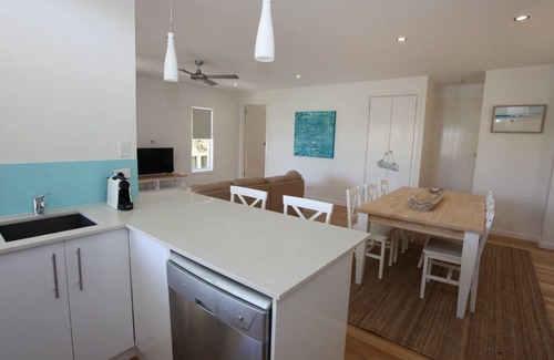 Dicky Beach House | Experience Coastal Bliss at Dicky Beach with Family Amenities