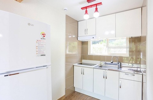 Gongju House | Eco-Friendly Comfort at Gongju Hayan Pension - 10/10 Rated