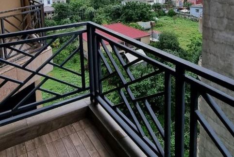 T'ba Apartment | Cozy Gonio: Family-Friendly Stay with Pool Access