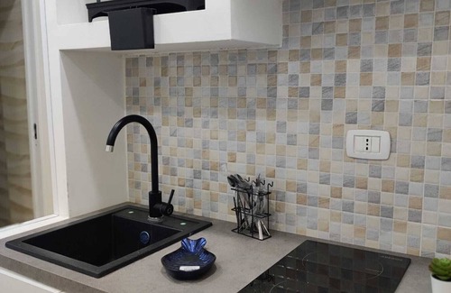 Quartieri Spagnoli Apartment | Cozy Retreat at Good Friends Home with Family-Friendly Amenities