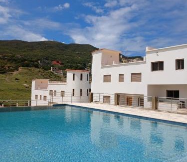 Taghramt Apartment | Relax at Good Life Mimosa with Pool and Family Amenities