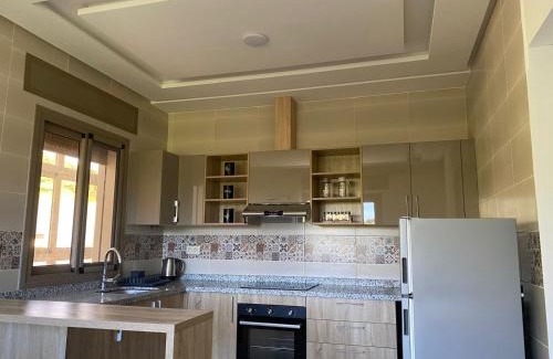Taghramt Apartment | Relax at Good Life Mimosa with Pool and Family Amenities