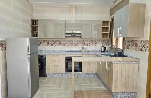 Taghramt Apartment | Discover Comfort at Good Life Tulipe with Pool Access