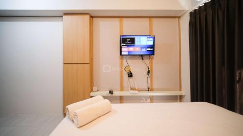 Sidoarjo Apartment | Convenient Studio Apartment at Suncity Residence by Travelio