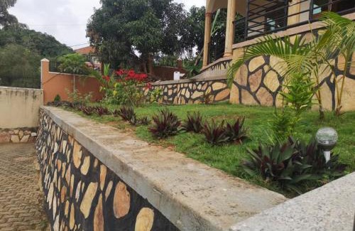 Kampala House | Exceptional Good Times Hotel: Family-Friendly with Kitchen
