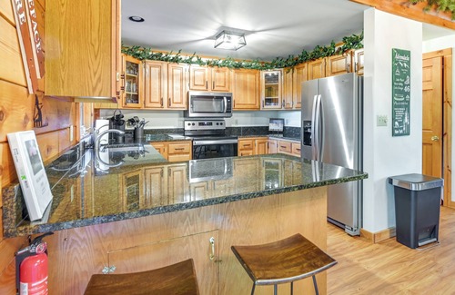 North Creek Cottage | Charming Gore Mountain Cabin with Game Room & Fire Pit