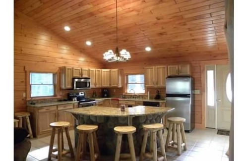 North Creek Cabin | Gore Mountain Log Cabin Getaway with Pool and Hot Tub