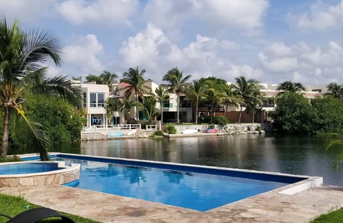 Puerto Aventuras Condo | Discover a 3 Bdrm Lagoon Condo with Pool & Ocean Views
