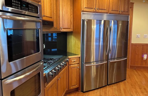 Cheboygan House | Gorgeous 6-bedroom house on Lake Huron featuring on-site rentals