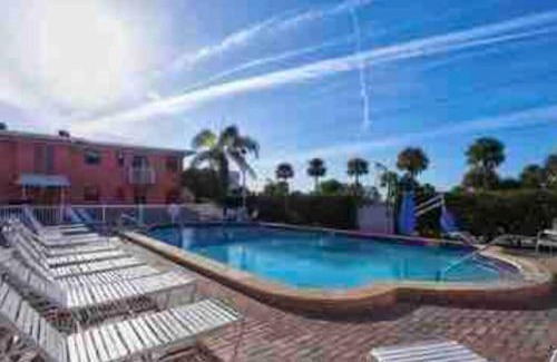 St. Pete Beach Apartment | Seaside Escape with Balcony and Heated Pool Awaits You