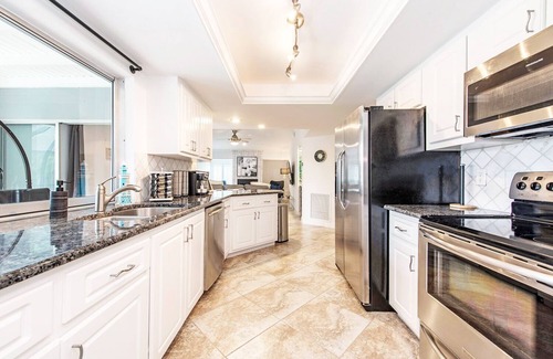 Palm River Estates House | Inviting Oceanfront Home with Private Pool and Spa