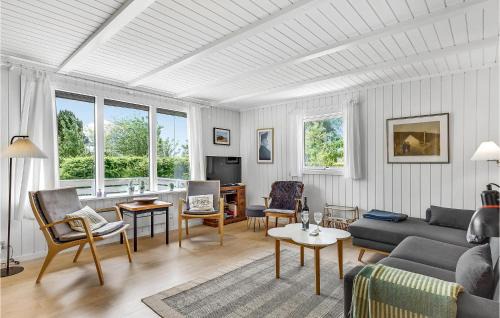 Hvidbjerg Strand House | Modern Home in Børkop with Family-Friendly Kitchen