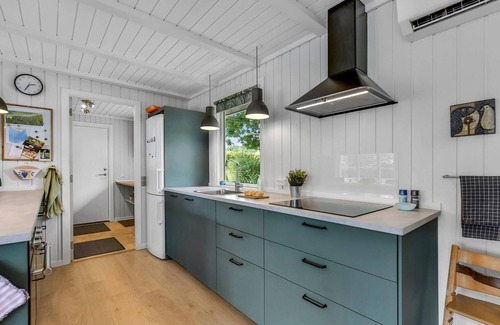 Hvidbjerg Strand House | Cozy Cottage Retreat with Oceanfront Views and Spa