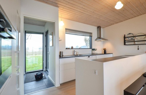 Femmøller House | Beachfront Vacation Home with Ocean Views and Spa Amenities