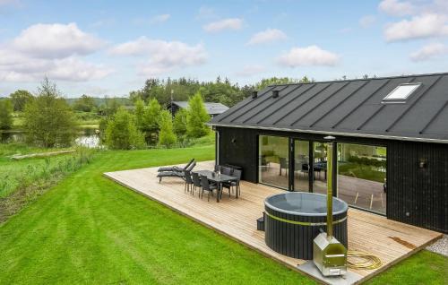 Fjellerup Strand House | Inviting Home in Glesborg with Pool and Kitchen Access
