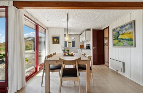 Haurvig House | Experience a Cozy Oceanfront Retreat with Scenic Views