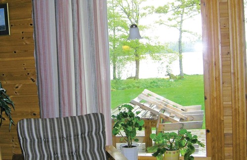 Ljungby House | Experience a Unique Wooden House on Lake Flären