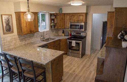 Sunset Heights House | Island-Themed Retreat with Ocean Views & Spa in Orem, UT