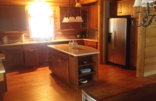 White Oak Cabin | Serene Lakefront Log Home with Private Beach & Boat Dock
