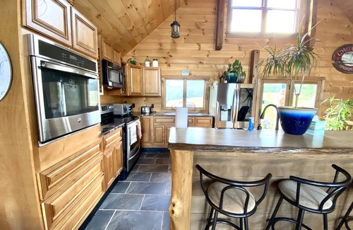 Harrisonville Cabin | Inviting Log Cabin with Scenic Views & Family-Friendly Perks