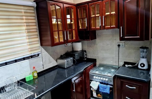 Adenta Apartment | Cozy Retreat Near Highway with Child-Friendly Amenities