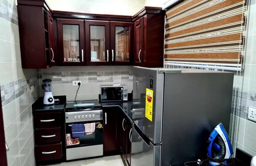 Adenta Apartment | Cozy Retreat Near Highway with Child-Friendly Amenities
