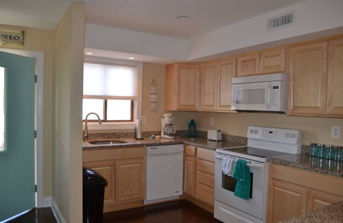 Caine Woods House | Impeccably Renovated Townhouse with Ocean View & Pool