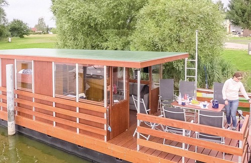 Demmin Boat Rental | Modern 2 Bedroom Retreat in Scenic Loitz with Spa & Lake View