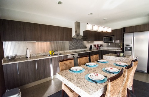 Playacar Fase II Condo | Elegant Vaiven Playacar Penthouse with Private Rooftop