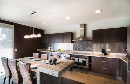 Playacar Fase II Condo | Elegant Vaiven Playacar Penthouse with Private Rooftop