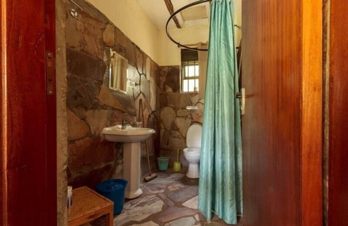 Bwindi Cabin | Gorilla Valley Lodge: Family-Friendly Retreat with Dining Options