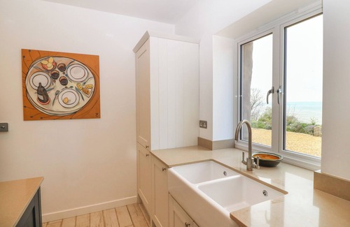 Beaumaris Cottage | GORPHWYSFA: Pet Friendly Cottage with Ocean Views in Llanddona