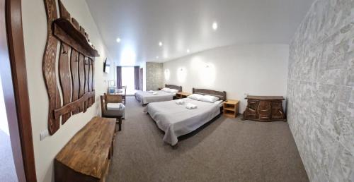 Pylypets Hotel | Discover Comfort at Goryanyn with Pool & Family-Friendly Amenities