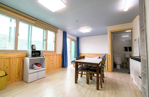 Tonmak House | Relax at Goseong San Deul Bada Pension with Pool & Family Amenities