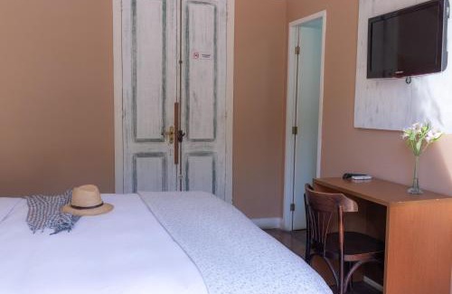 Historic Center Hotel | Relax at Kastel Grão Pará with Pool and Ocean Views
