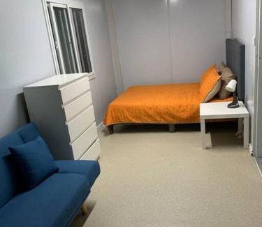 Crosbies Apartment | Experience Grace Container Homes: Family-Friendly Getaway