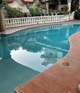 Dauin Resort | Cozy Gracey Dive Resort with Oceanfront Dining and Pool