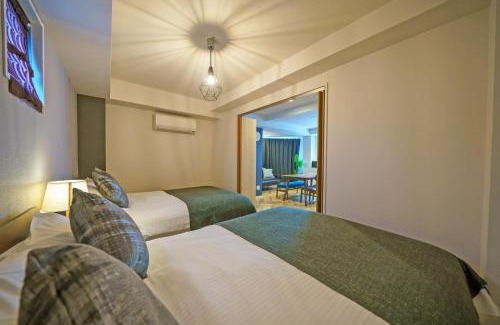 Minamisenba Apartment | Discover Gracia Hotel: Family-Friendly Comfort Awaits