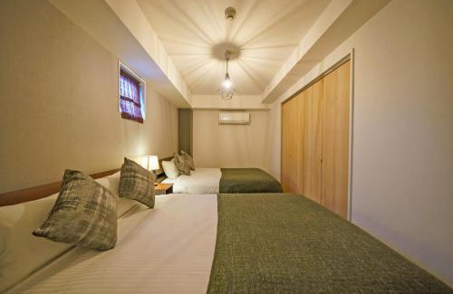 Minamisenba Apartment | Discover Gracia Hotel: Family-Friendly Comfort Awaits
