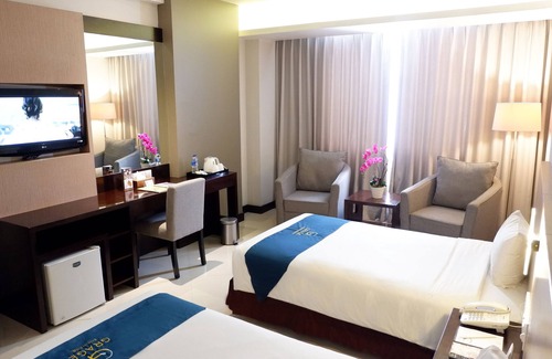 West Cirebon Hotel | Relax at Grage Hotel Cirebon: 4-Star Stay with Pool & Spa