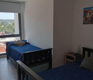 Villa Carlos Paz Apartment | Stylish Gran Duplex Paseo Quattro 22 with Pool & Ocean View