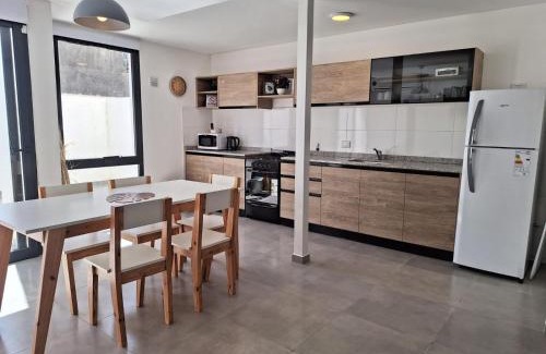 Villa Carlos Paz Apartment | Stylish Gran Duplex Paseo Quattro 22 with Pool & Ocean View